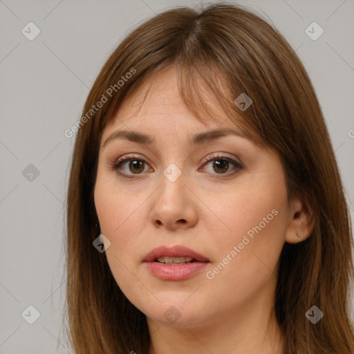 Neutral white young-adult female with long  brown hair and brown eyes