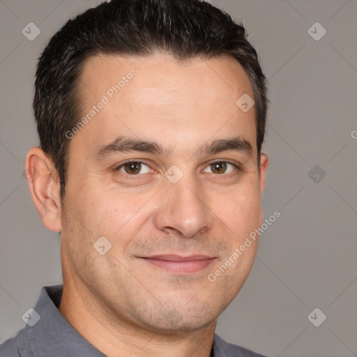 Joyful white adult male with short  brown hair and brown eyes