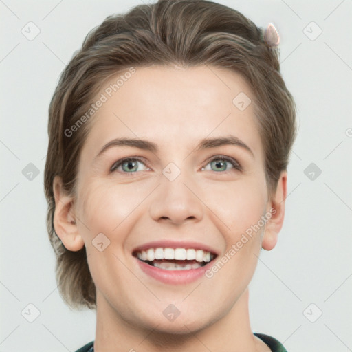 Joyful white young-adult female with medium  brown hair and grey eyes