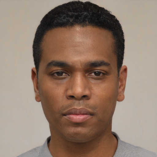 Neutral black young-adult male with short  black hair and brown eyes