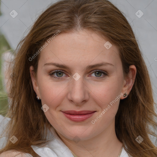 Joyful white young-adult female with long  brown hair and blue eyes