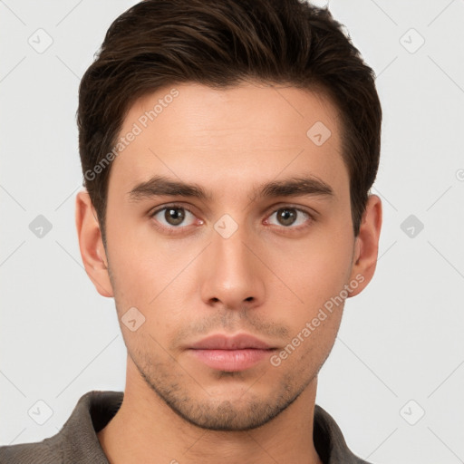 Neutral white young-adult male with short  brown hair and brown eyes