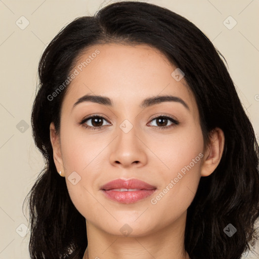 Joyful white young-adult female with long  black hair and brown eyes