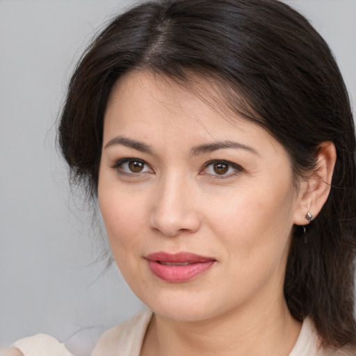 Joyful white young-adult female with medium  brown hair and brown eyes