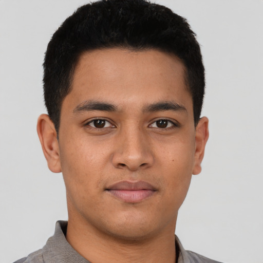 Neutral latino young-adult male with short  brown hair and brown eyes