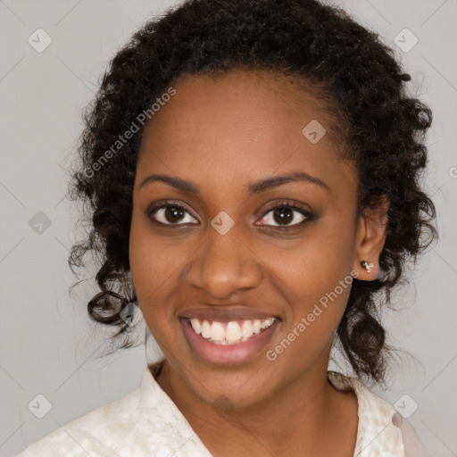 Joyful black young-adult female with medium  brown hair and brown eyes