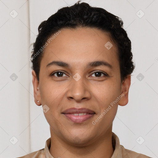 Joyful latino young-adult female with short  brown hair and brown eyes