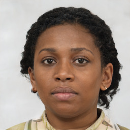 Neutral black young-adult female with short  brown hair and brown eyes