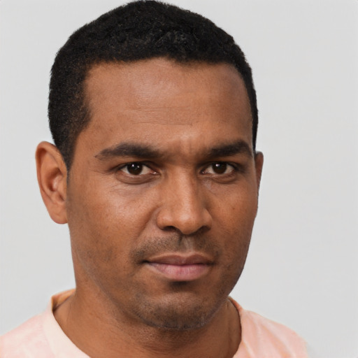 Neutral latino young-adult male with short  brown hair and brown eyes