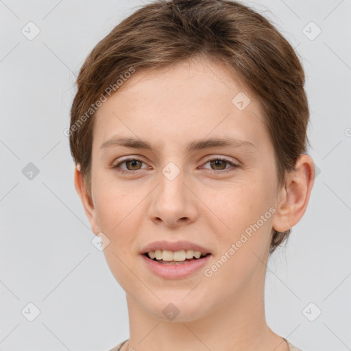 Joyful white young-adult female with short  brown hair and grey eyes