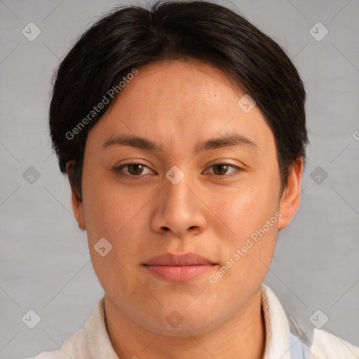 Joyful asian young-adult female with short  brown hair and brown eyes