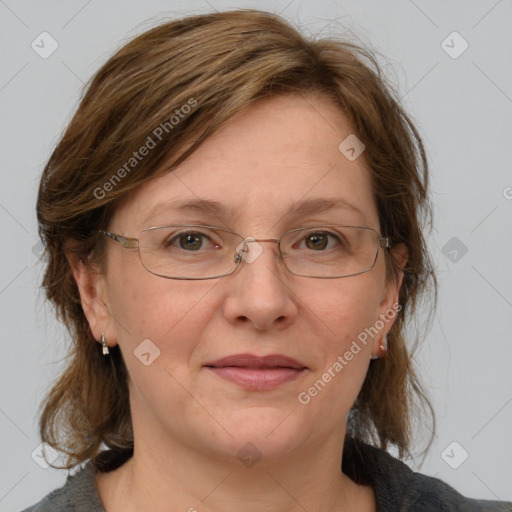 Joyful white adult female with medium  brown hair and grey eyes