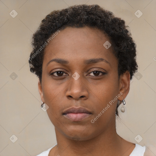 Neutral black young-adult female with short  brown hair and brown eyes