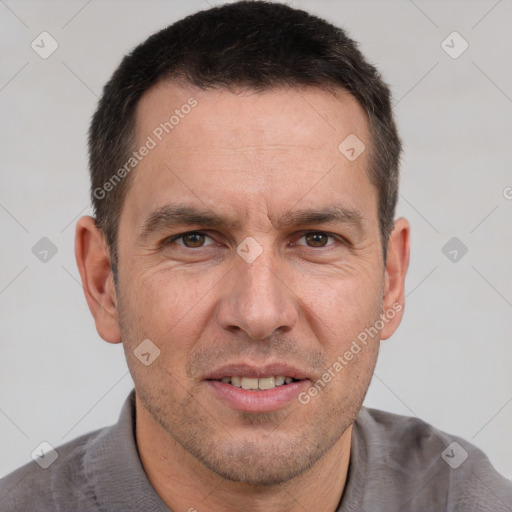 Joyful white adult male with short  brown hair and brown eyes