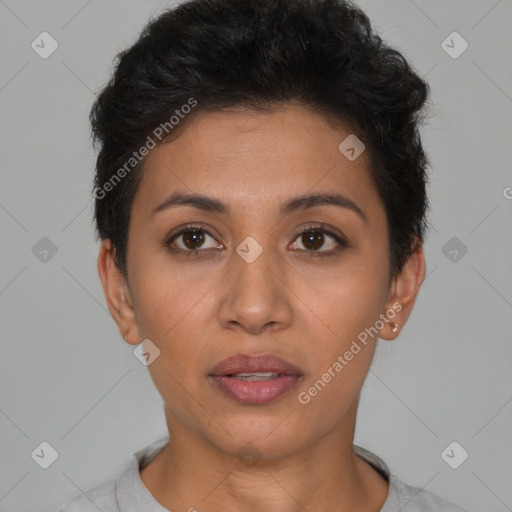 Joyful latino young-adult female with short  brown hair and brown eyes