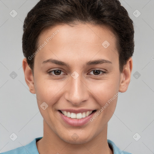 Joyful white young-adult female with short  brown hair and brown eyes