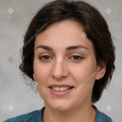 Joyful white young-adult female with medium  brown hair and green eyes