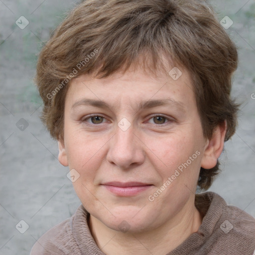 Joyful white adult female with short  brown hair and grey eyes