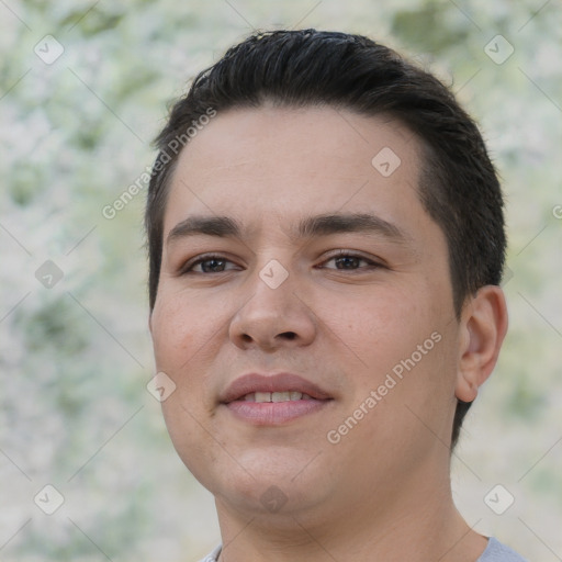 Joyful white young-adult male with short  black hair and brown eyes