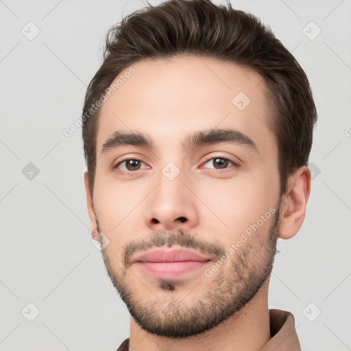 Neutral white young-adult male with short  brown hair and brown eyes