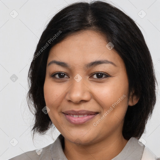 Joyful latino young-adult female with medium  brown hair and brown eyes