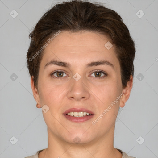 Joyful white young-adult female with short  brown hair and grey eyes