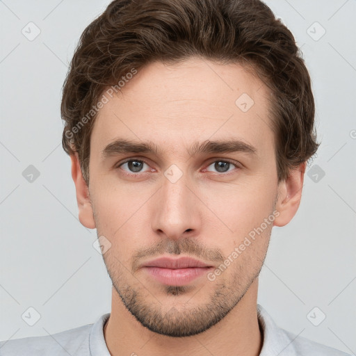 Neutral white young-adult male with short  brown hair and grey eyes