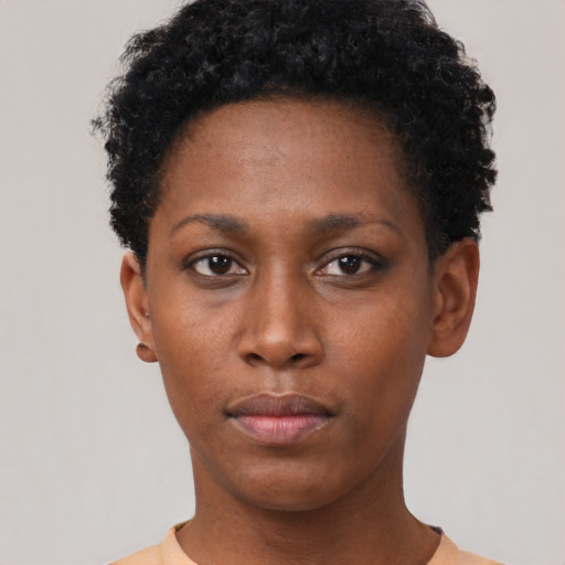 Neutral black young-adult female with short  black hair and brown eyes