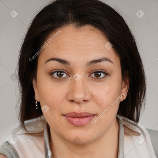 Joyful latino young-adult female with medium  brown hair and brown eyes