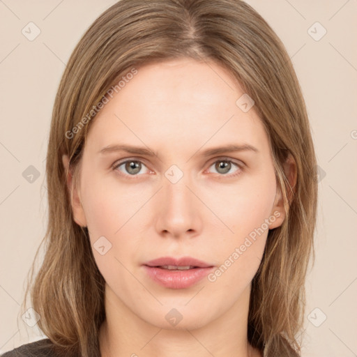 Neutral white young-adult female with long  brown hair and brown eyes