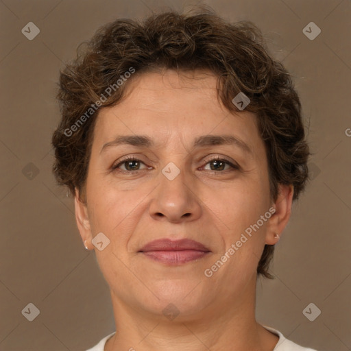 Joyful white adult female with short  brown hair and brown eyes