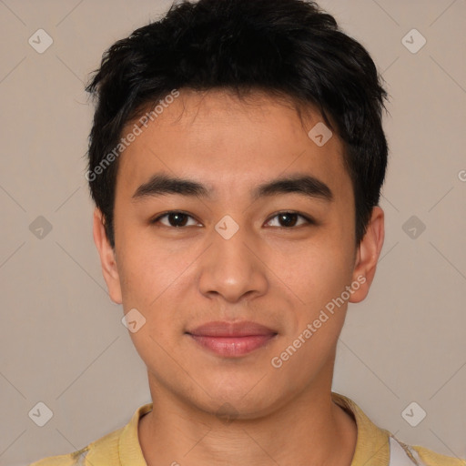 Joyful asian young-adult male with short  brown hair and brown eyes