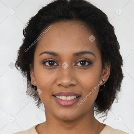 Joyful black young-adult female with long  brown hair and brown eyes