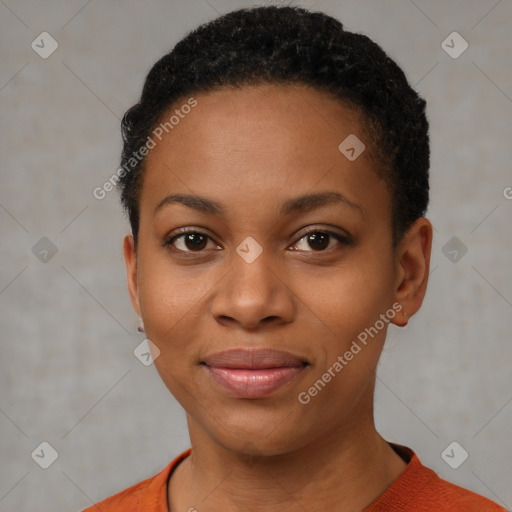 Joyful black young-adult female with short  black hair and brown eyes