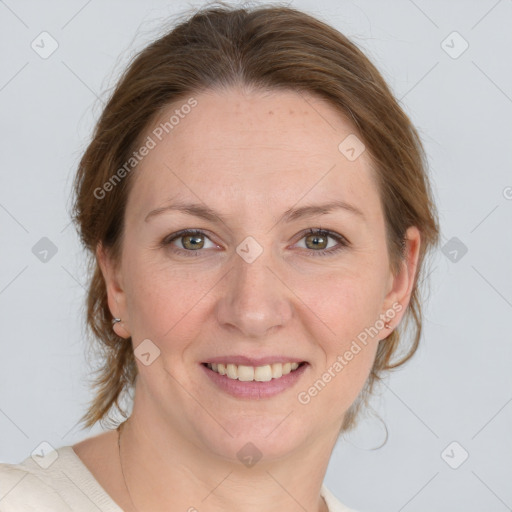 Joyful white adult female with medium  brown hair and grey eyes