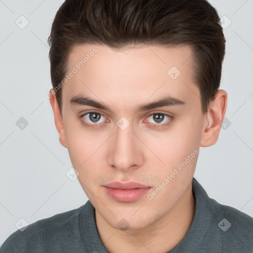 Neutral white young-adult male with short  brown hair and brown eyes