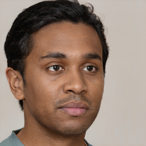 Neutral black young-adult male with short  brown hair and brown eyes