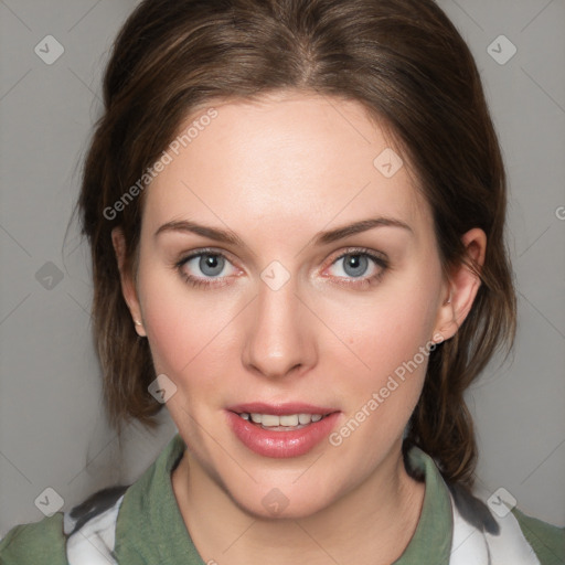 Joyful white young-adult female with medium  brown hair and blue eyes