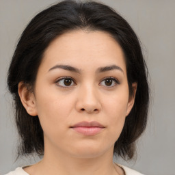 Neutral asian young-adult female with medium  brown hair and brown eyes