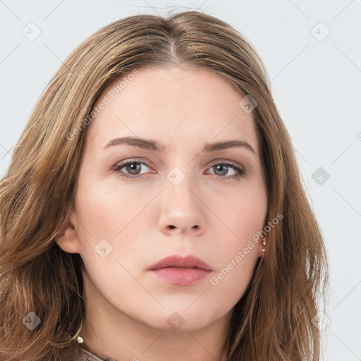 Neutral white young-adult female with long  brown hair and brown eyes