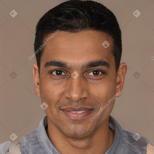 Joyful latino young-adult male with short  black hair and brown eyes