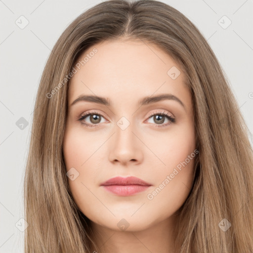 Neutral white young-adult female with long  brown hair and brown eyes