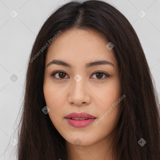 Joyful latino young-adult female with long  brown hair and brown eyes