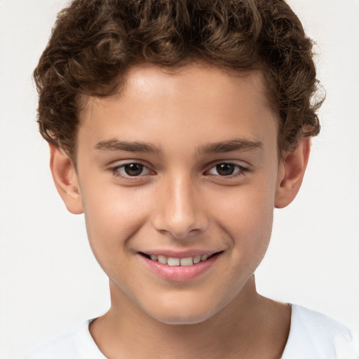 Joyful white child male with short  brown hair and brown eyes