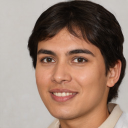 Joyful white young-adult male with medium  brown hair and brown eyes