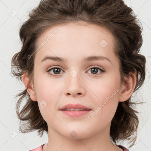 Joyful white child female with medium  brown hair and brown eyes