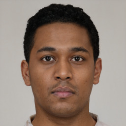 Neutral black young-adult male with short  brown hair and brown eyes