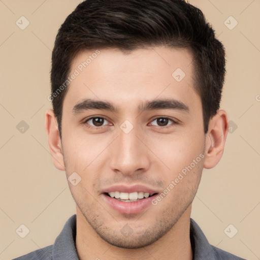 Joyful white young-adult male with short  brown hair and brown eyes