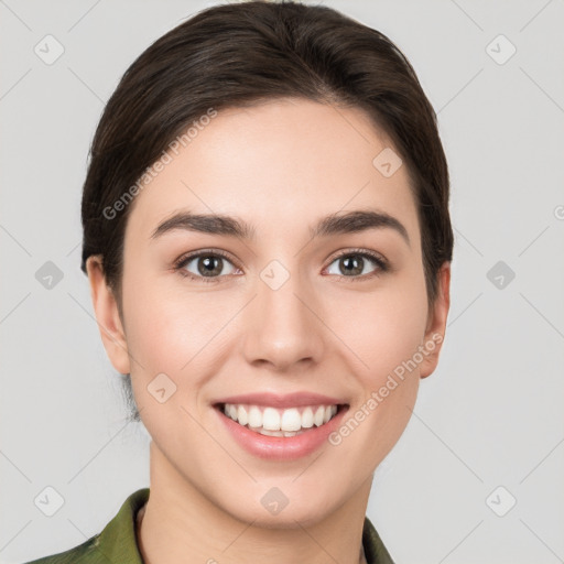 Joyful white young-adult female with medium  brown hair and brown eyes