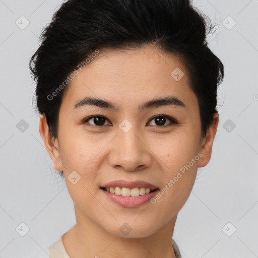 Joyful asian young-adult female with short  brown hair and brown eyes